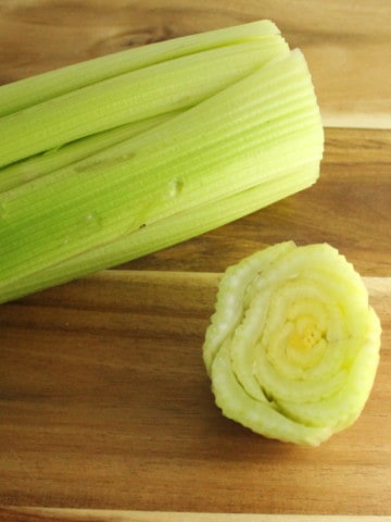 a bundle of celery with the bottom cut off