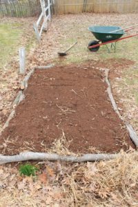 hugelkulture styled garden bed