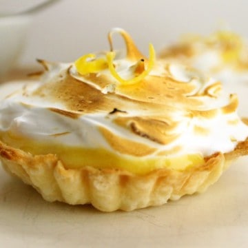 lemon meringue tart on a white plate