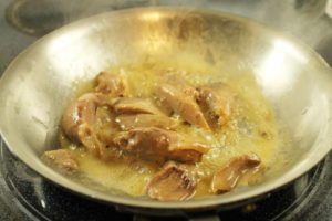 Sauteeing pork hock in a o pan