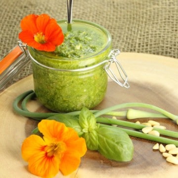 A deliciously simple Basil Pesto recipe using Garlic Scapes from the garden. A great way to preserve your basil harvest.