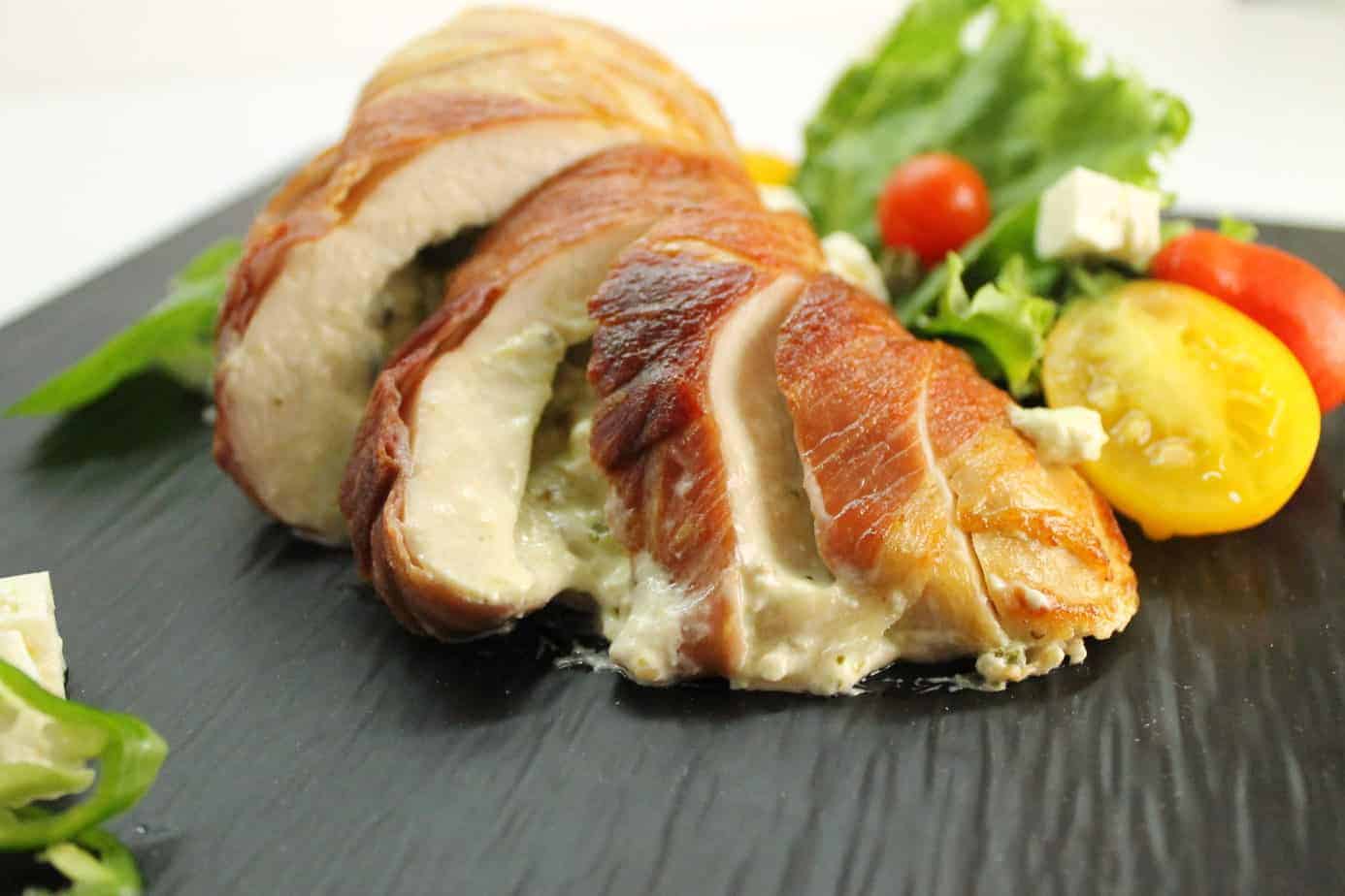 A savory stuffed chicken breast wrappen in Prosciutto bacon. Learn how to properly stuff chicken!