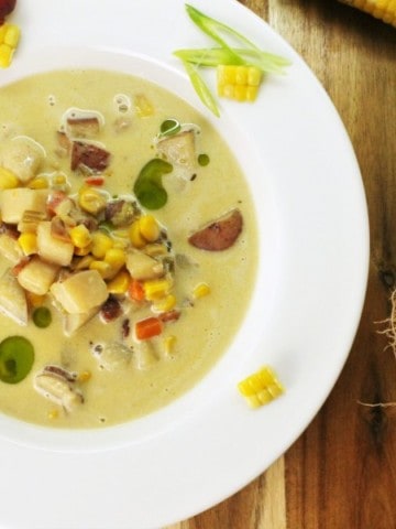 top down view of a bowl of potato bacon corn chowder