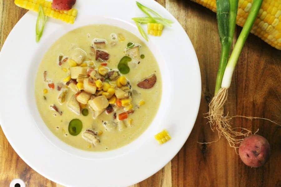 top down view of a bowl of potato bacon corn chowder