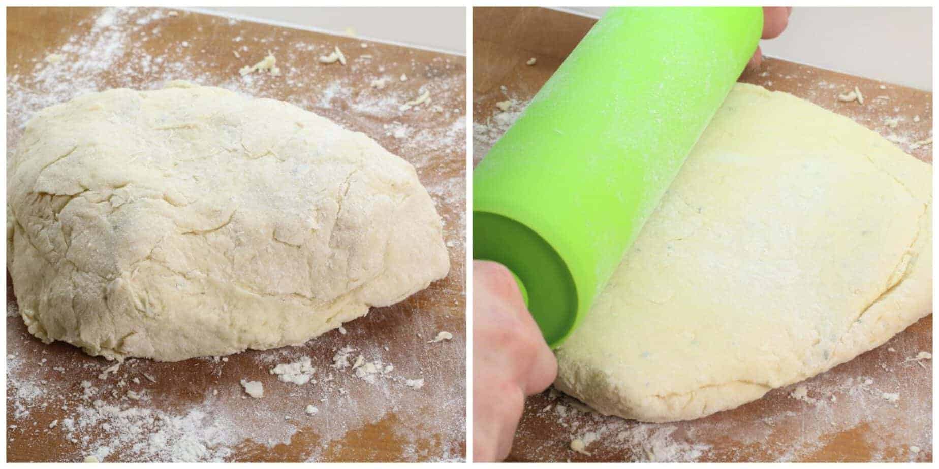 Rosemary & Garlic Biscuit dough being rolled out on a flour sprinkled wooden board