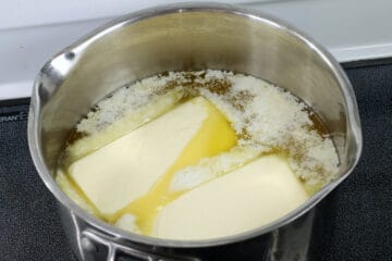 butter starting to melt in a steel pot