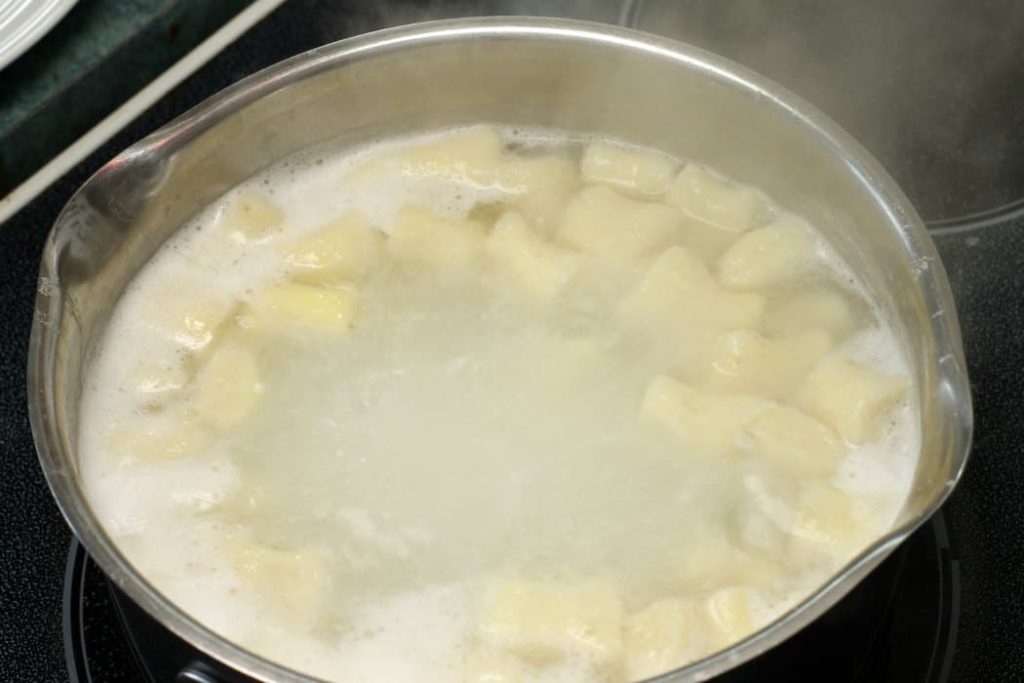 As soon as the gnocchi float, they are done cooking, scoop them out and cool or serve right away.