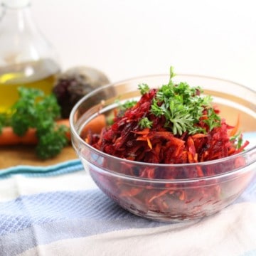 Using just a simple box grater, this healthy shredded beet salad with, carrots, apples, and walnuts is a great side to any meal. Clean eating and Paleo friendly