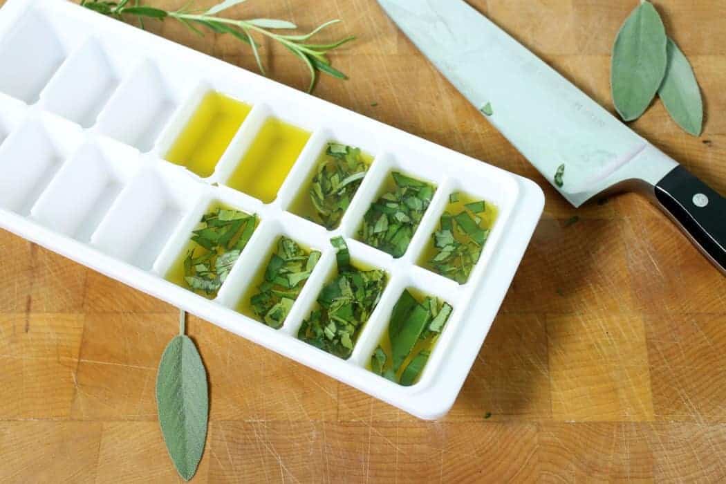 Store herbs in oil, by creating frozen oil pucks! Store these in the freezer and use them immediately in your cooking!
