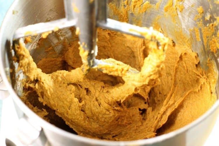 fully mixed pumpkin breakfast muffin batter in a mixing bowl