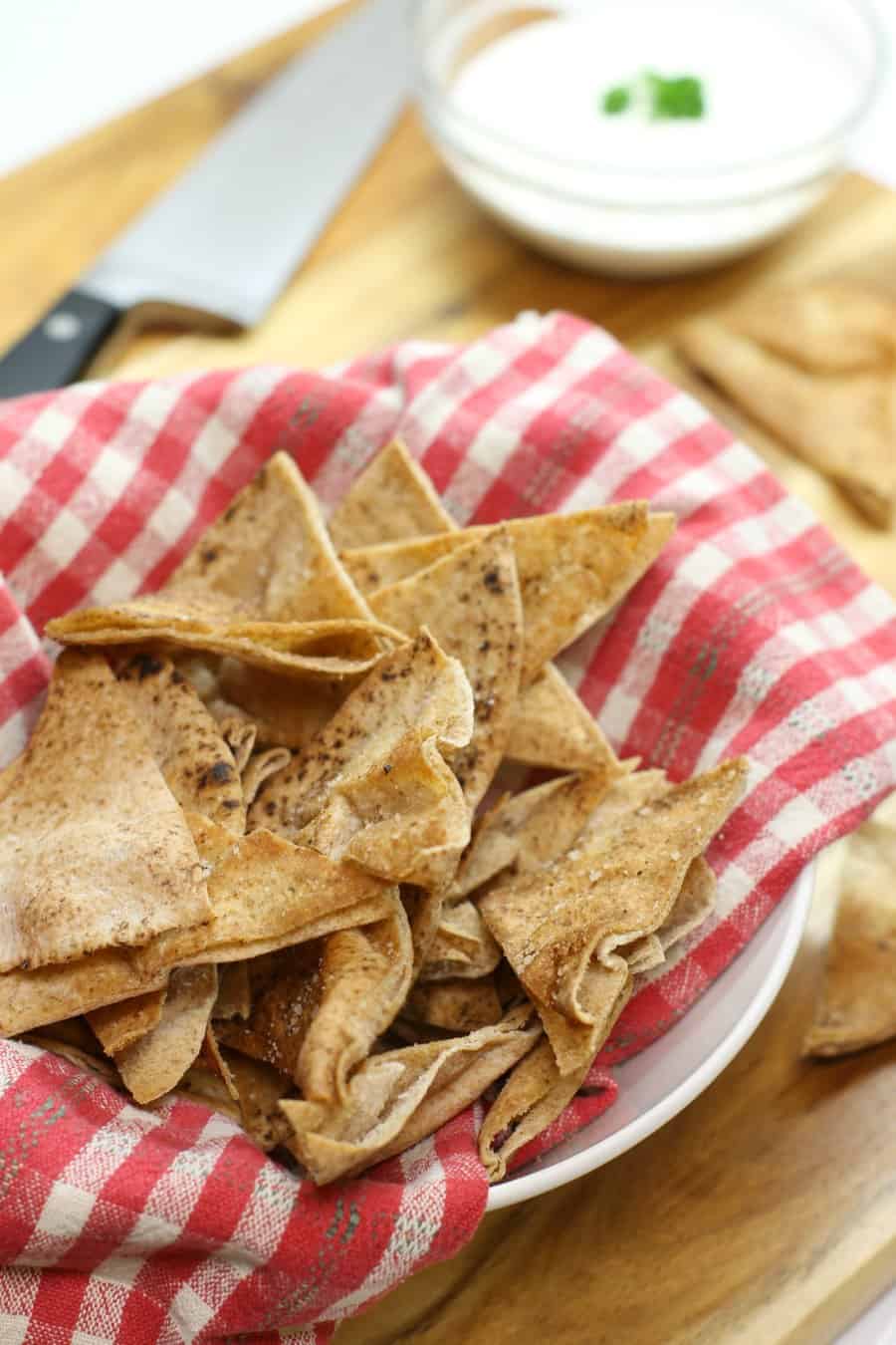 The perfect after school snack, oven baked pita chips with hummus and veg!