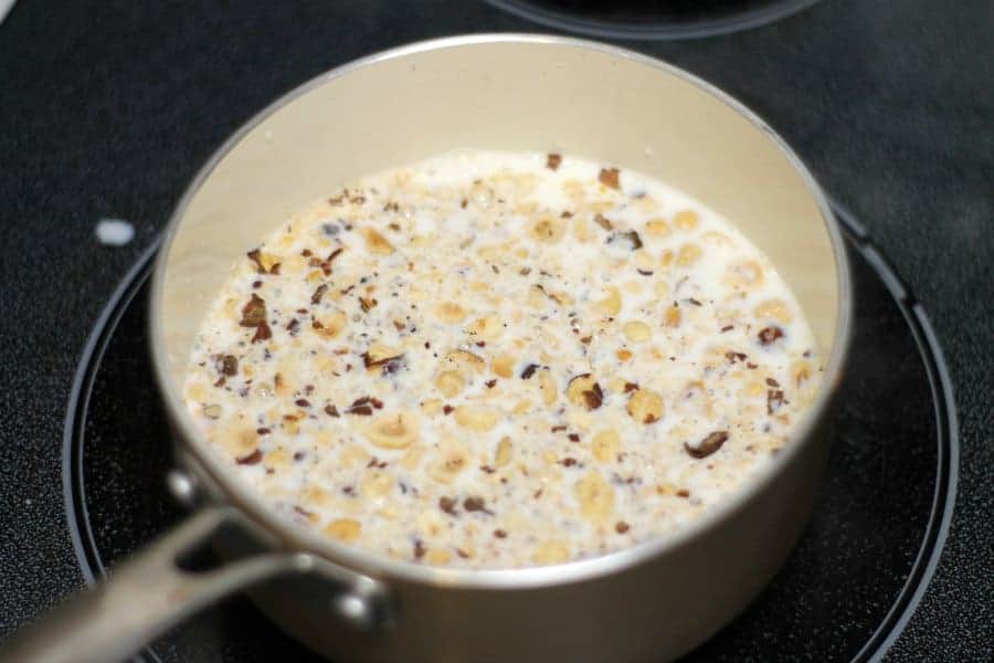 crushed hazelnuts simmering in milk