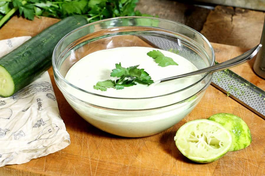 freshly made cucumber lime dip in a glass bowl