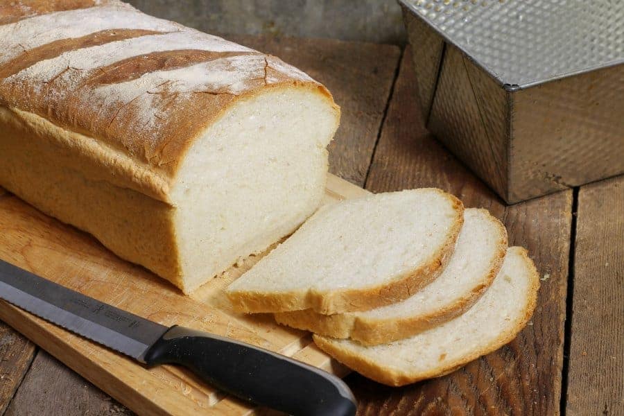 a freshly sliced loaf of homemade sandwich bread