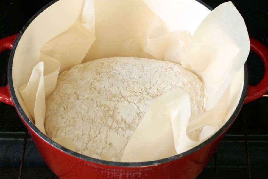 No knead sourdough in a enamel dutch oven ready for baking