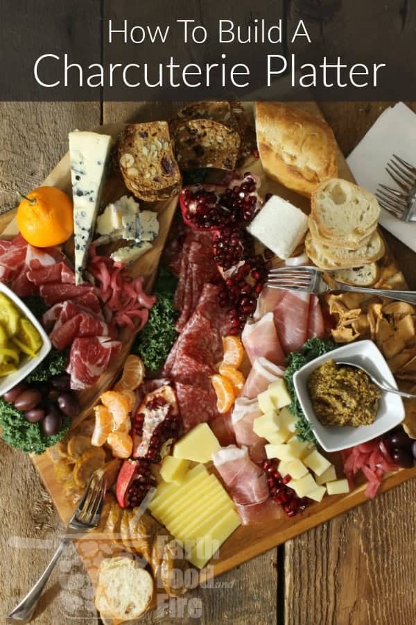 an overhead shot of a rustic themed charcuterie platter