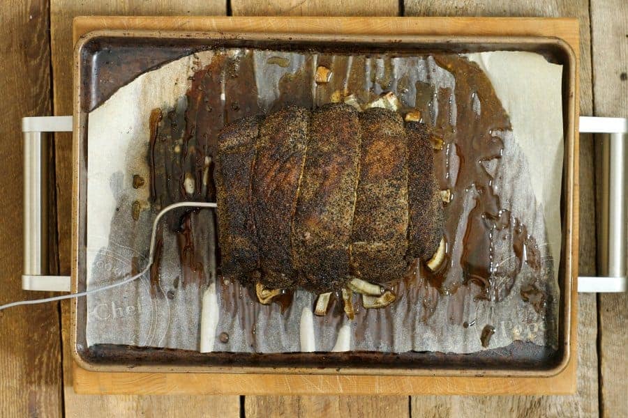 the cooked sirloin tip roast on a sheetpan fresh out of the oven