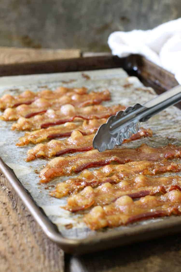 perfectly cooked oven baked bacon on a sheetpan