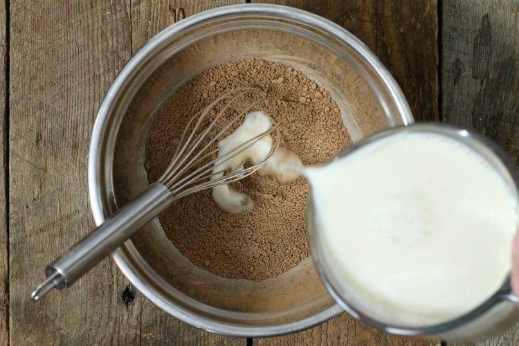 liquid ingredients being added to the chia seeds