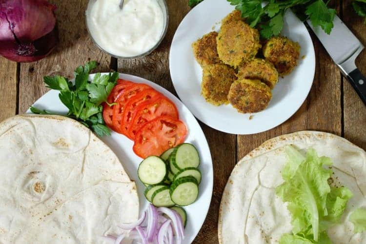 various ingredients needed to make healthy falafel wraps at home