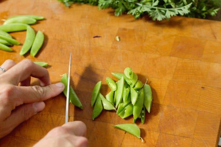 trimming sugar snap peas