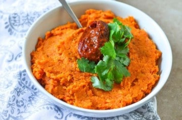 chipotle mashed sweet potatoes in a white bowl