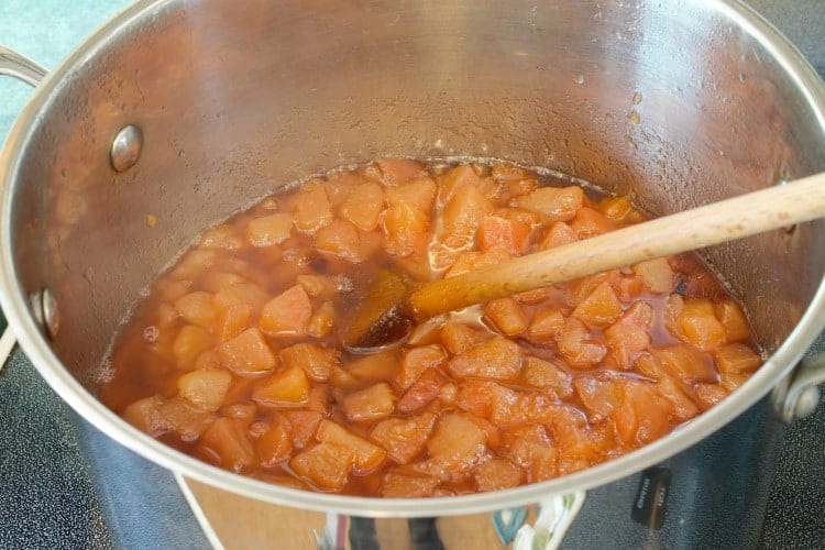 chopped pears cooking in a pot