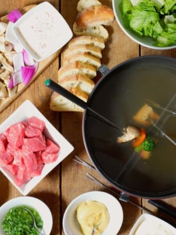 cropped-beef-fondue-served-on-wooden-table.jpg