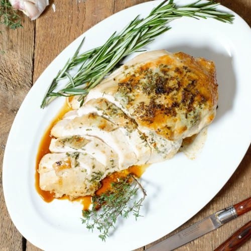 https://www.earthfoodandfire.com/wp-content/uploads/2019/11/overhead-shot-oven-roasted-turkey-breast-with-garlic-and-herbs-500x500.jpg