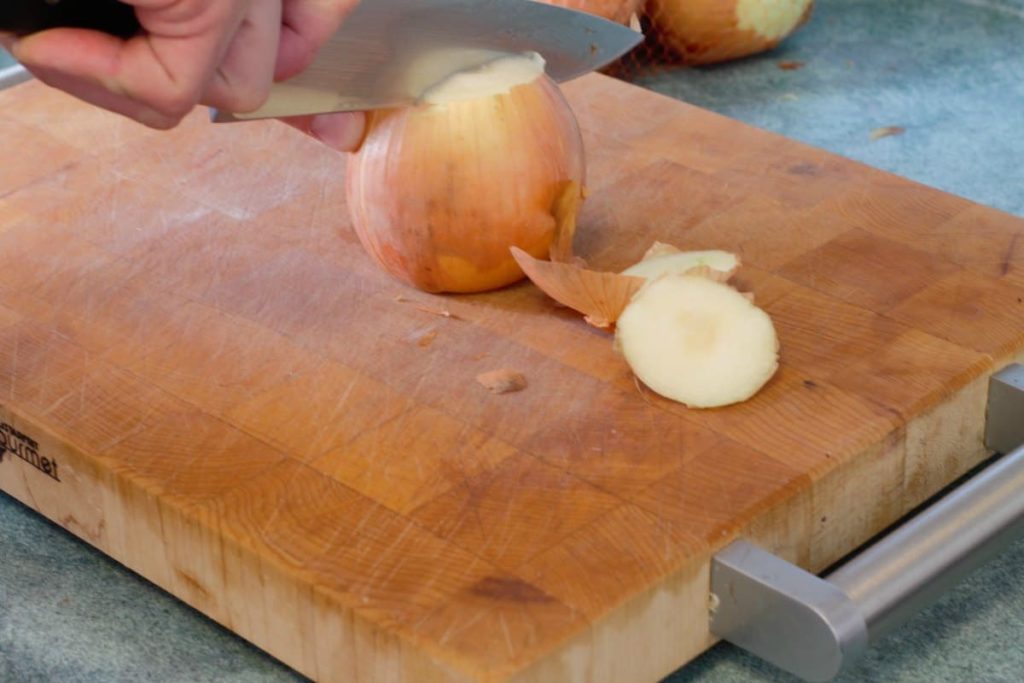 cutting an onion in half