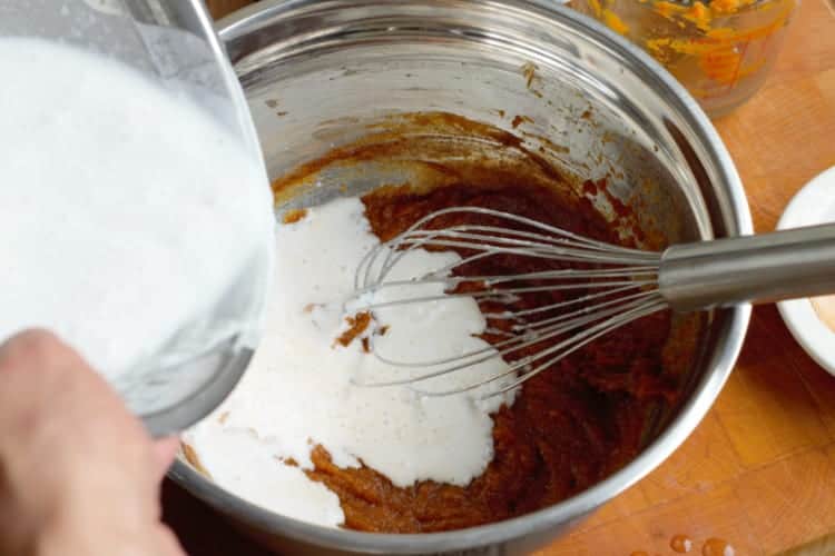 adding coconut milk to the ice cream base