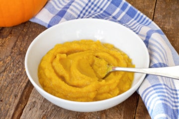 homemade pumpkin puree in a white bowl
