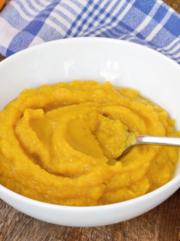 homemade pumpkin puree in a white bowl