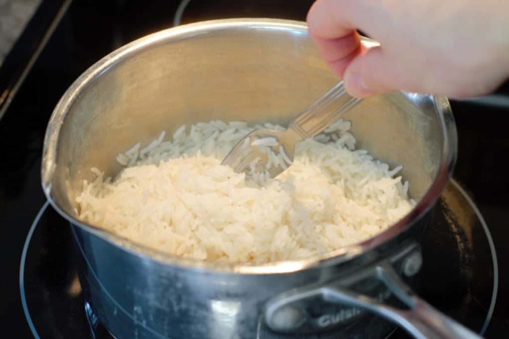 fluffing cooked basmati rice