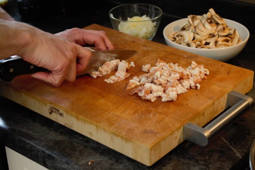 dicing bacon with a chefs knife