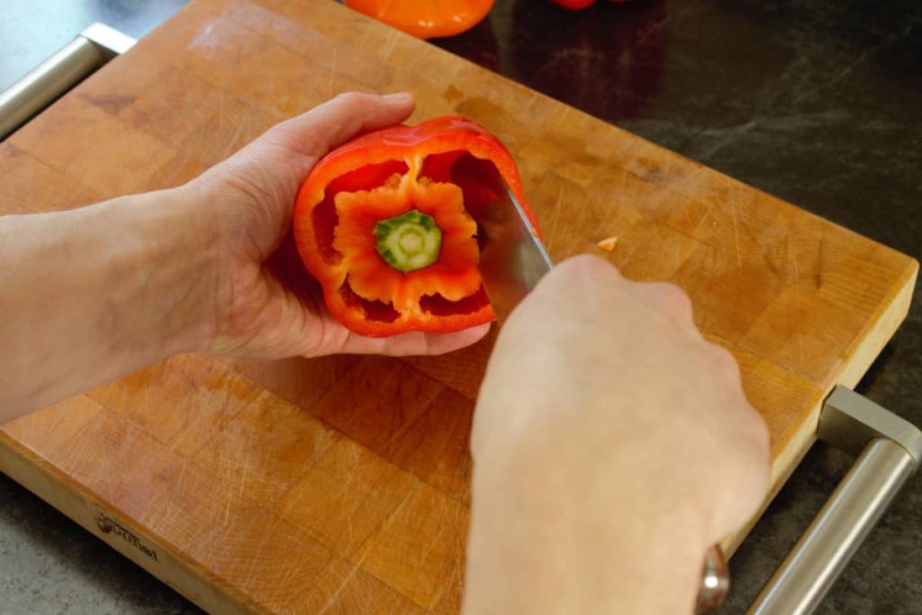 a hollowed out red bell pepper, ready to be stuffed