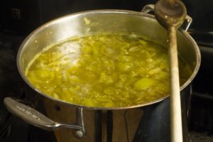 green tomato chow in a steel pot after cooking for two hours