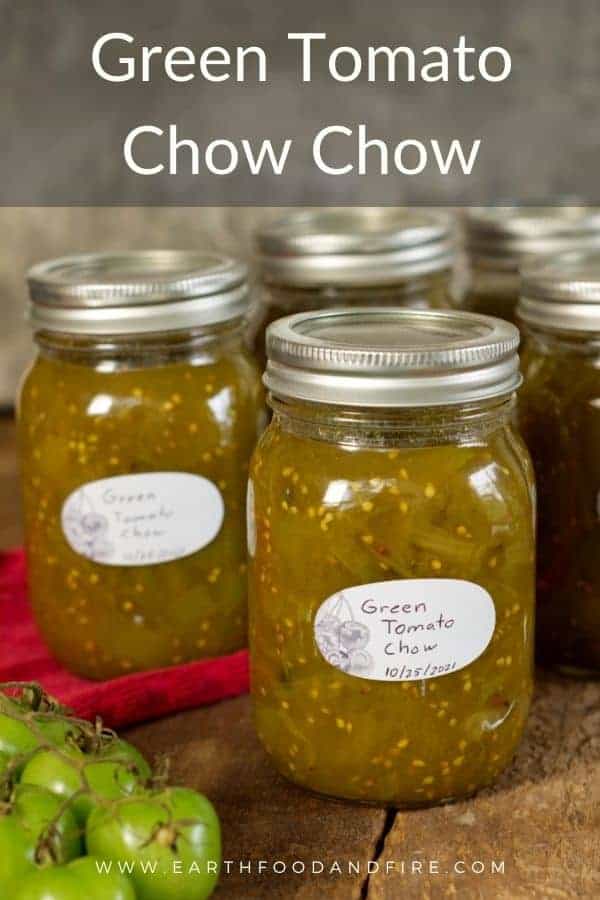vertical pinterest image of jars of canned green tomato chow