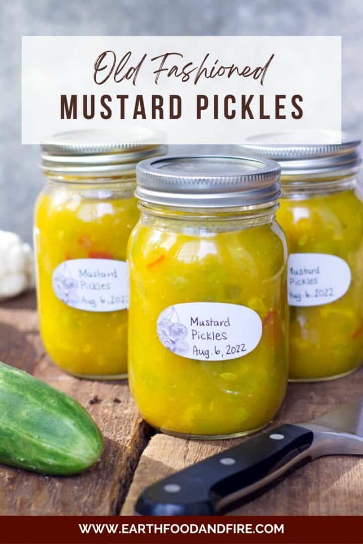 A vertical pinterest image of three jars of mustard pickles in glass jars. The jars are displayed on rustic wood boards. The image is overlaid with a banner reading