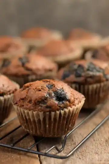 Blueberry bran muffins on a cooling rack