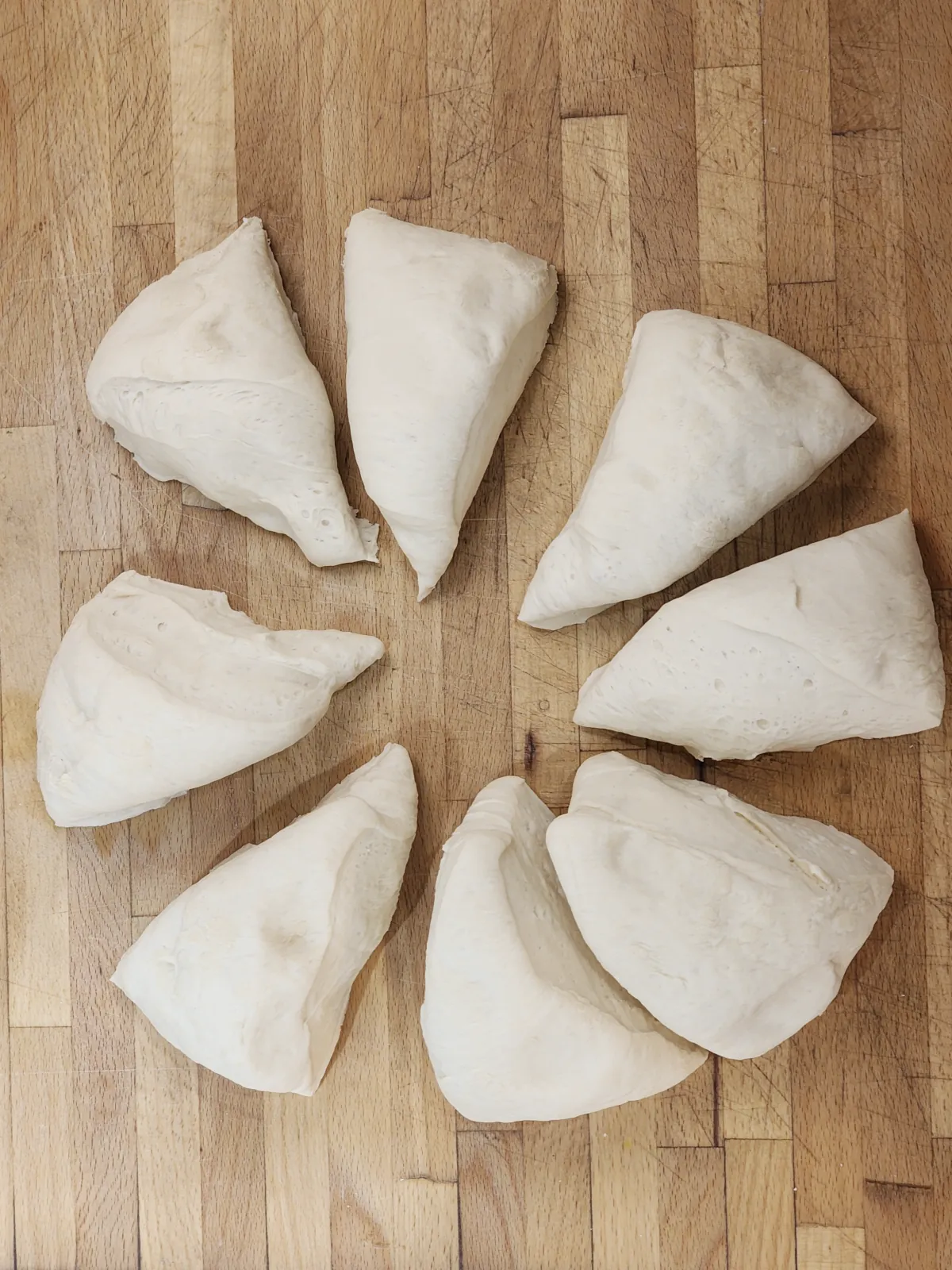Homemade pizza dough divided to 8 pieces