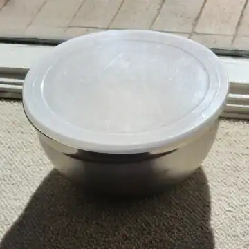 Rising the homemade pizza dough in the sunny spot