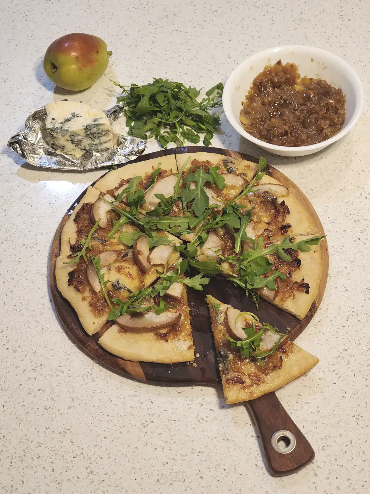 Homemade pizza with blue cheese and pear