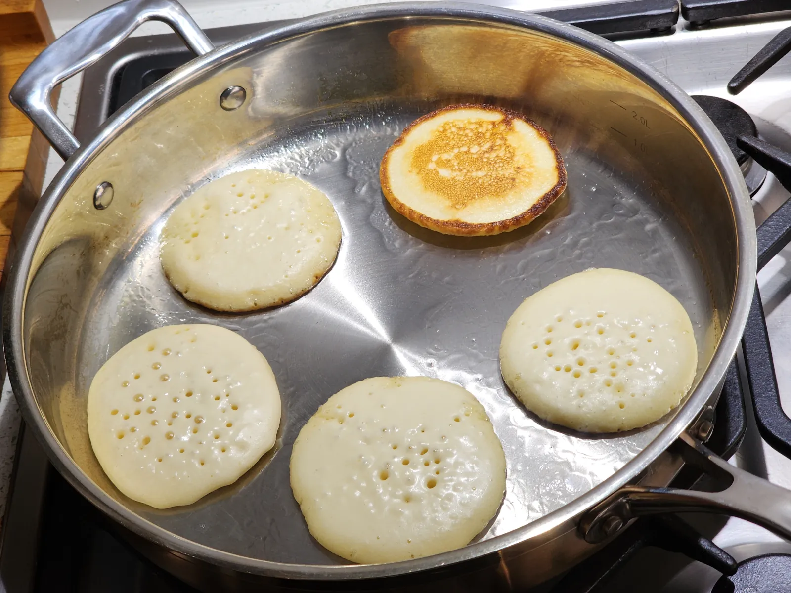 Frying mini pancakes - second side