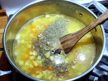 Added water, potatoes, and seasonings to make a homemade potato soup (gluten-free)