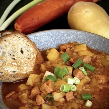 A bowl of the potato goulash with sausage