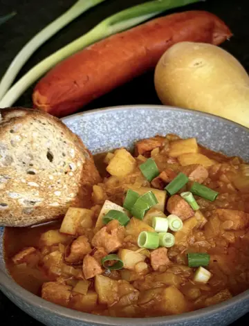 A bowl of the potato goulash with sausage