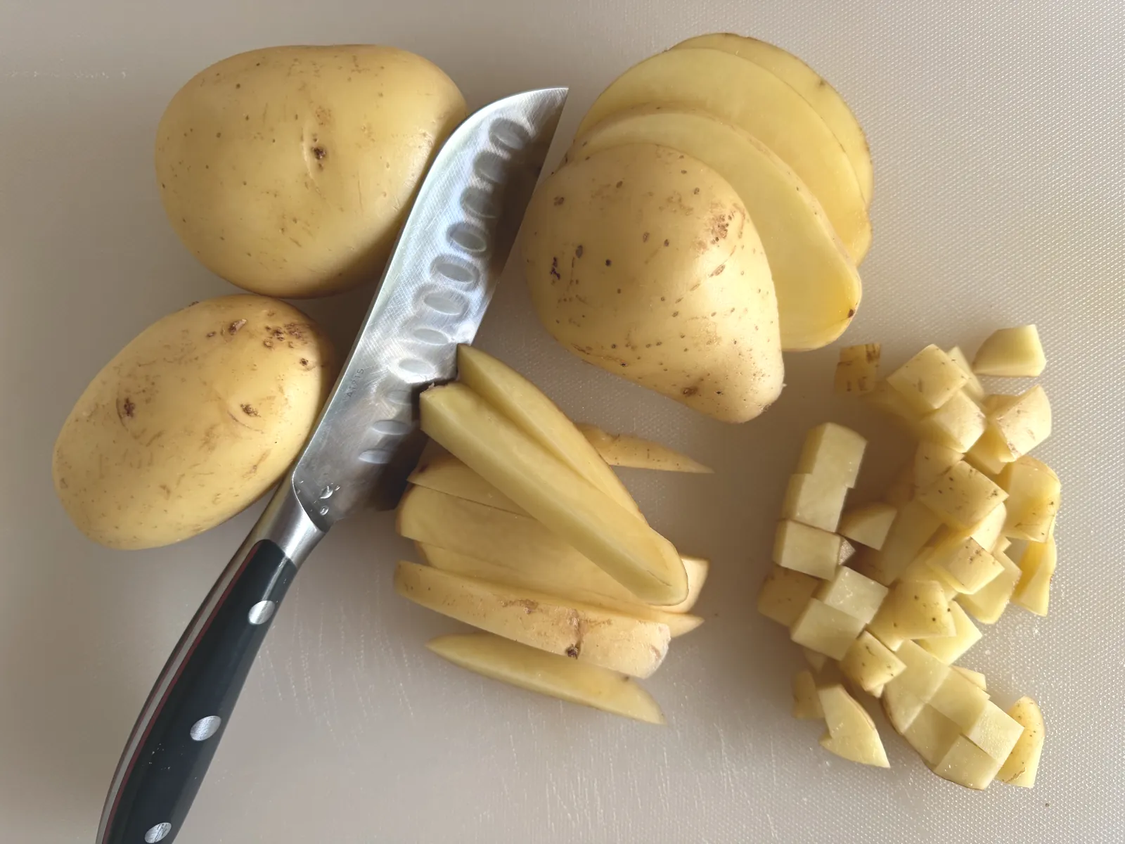 Diced potatoes for the potato goulash