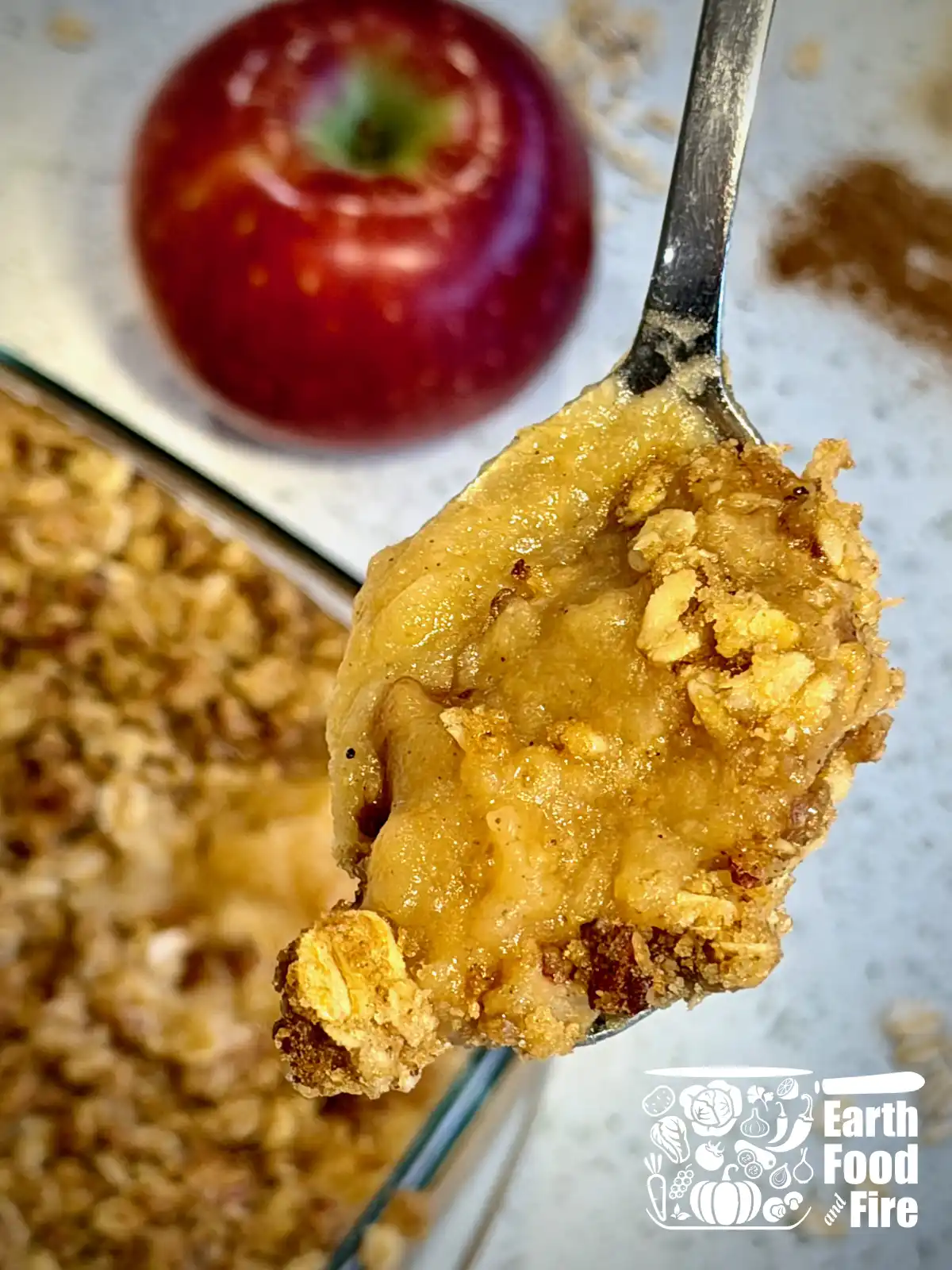 A spoonful of freshly baked applesauce crisp