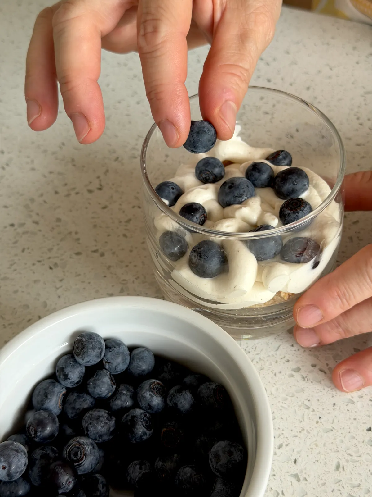 Adding layer of blueberries on top of the filling